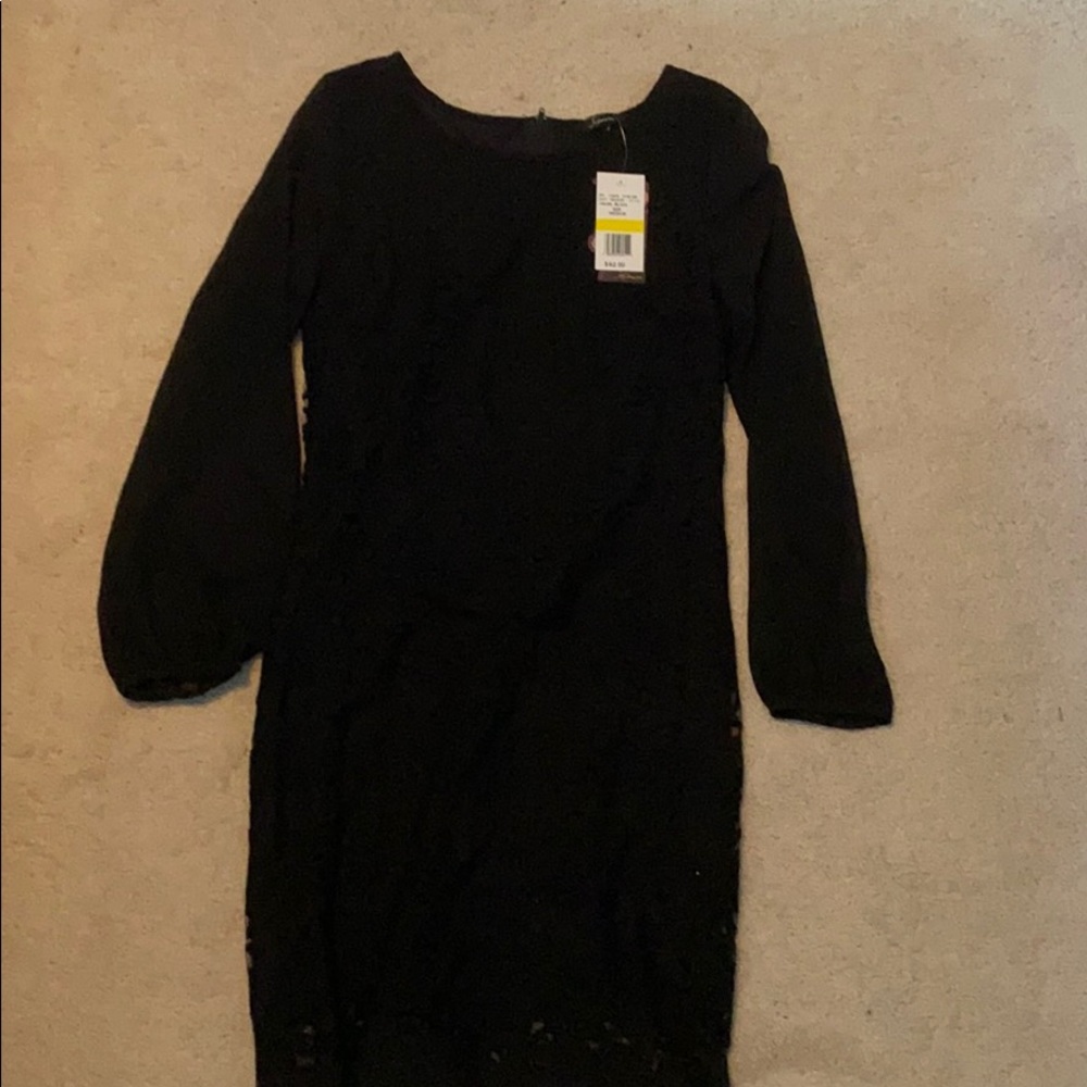 Black long sleeve knee length dress